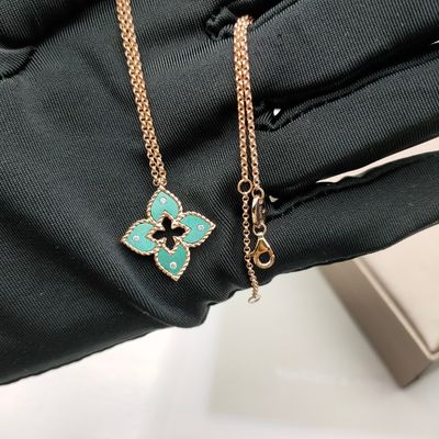 طلای واقعی 18 کیلوگرم در گوشواره و گردنبند با یاقوت طبیعی